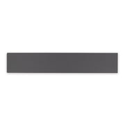 A charcoal black 17.5" X 3.25" plank look tile with subtle texture and pattern for floors or walls. 