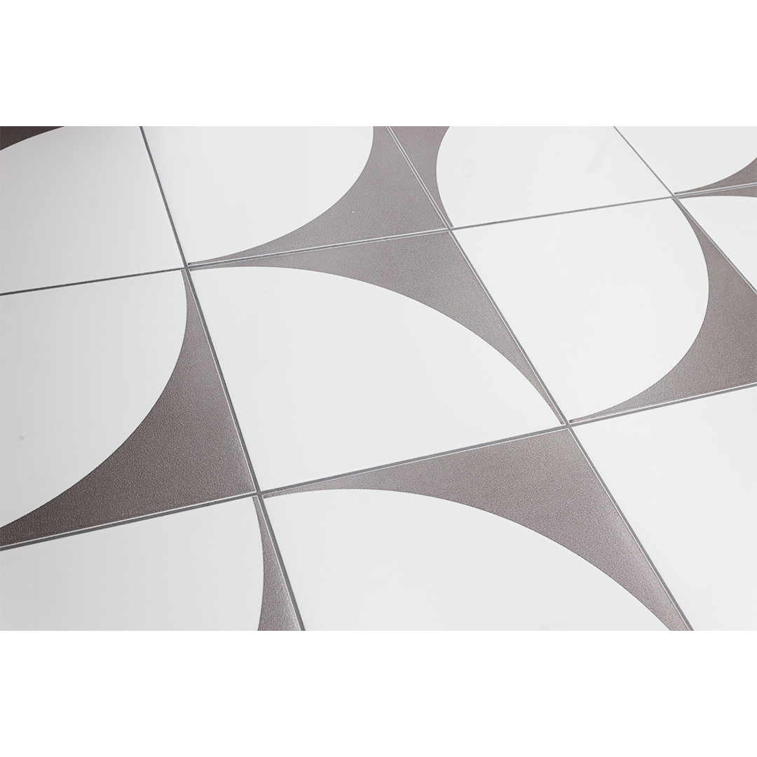 Harvest Moon Grey and White modern matte porcelain decorative pattern tiles laid out in a fun random pattern for visual interest. 
