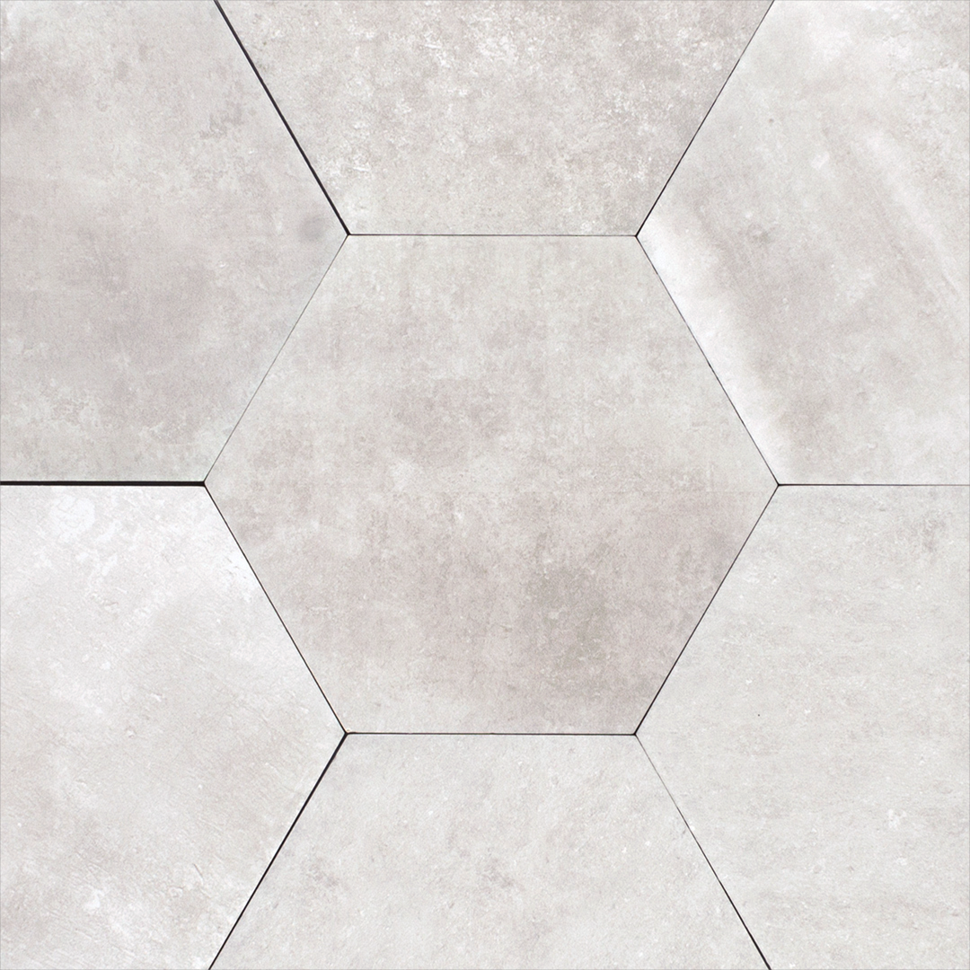 A group of 6" hexagon clay silver cement grey stone look tiles