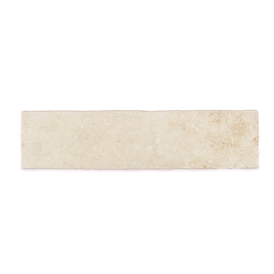 A single 11x2.75 brick clay chalk white stone look tile with a natural looking edge and earthy pattern
