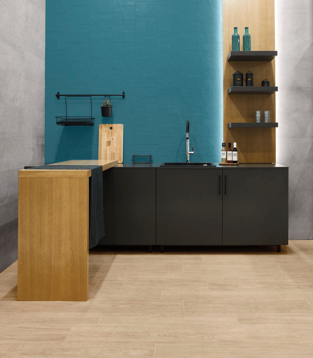 A modern kitchenette with nordic vanilla wood look plank tiles on the floor. 