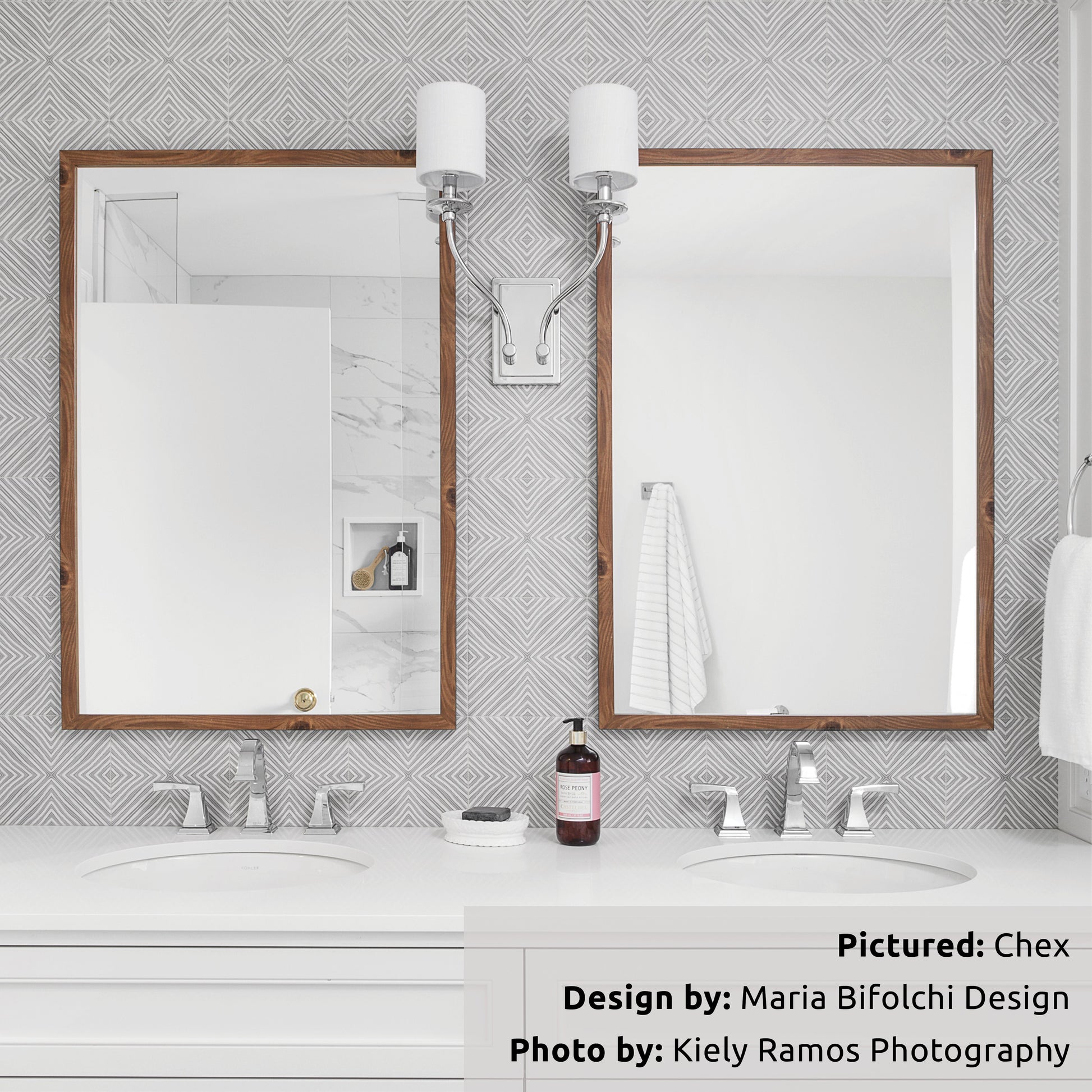 A bathroom vanity wall with double sinks and mirrors. The tile backsplash is 8x8 pattern grey and white chex tiles. The pattern adds a visual texture and interest. 