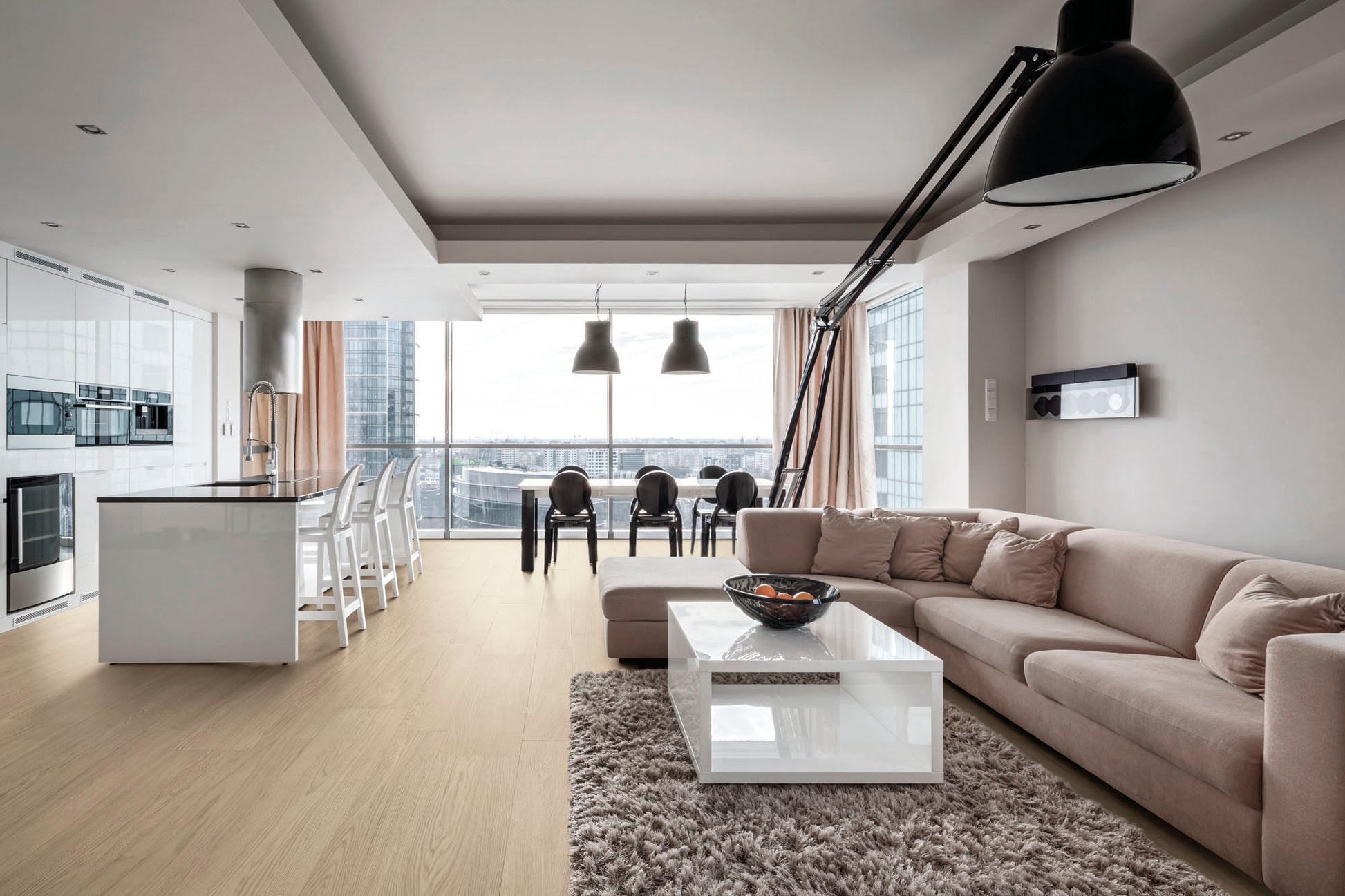 A modern condo with white finishes and the flooring is nordic vanilla wood look plank tiles. 