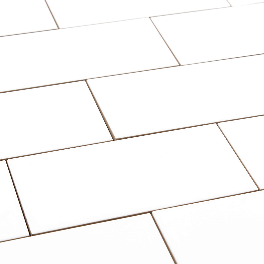 brick layout of 3x6 glossy white subway tile, a classic choice for bathrooms, kitchens, backsplashes and more