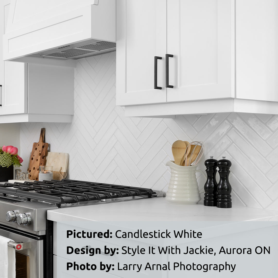 Candlestick White Spanish Ceramic Tile 10x2 Glossy. Installed in herringbone in a Kitchen Backsplash. Tile from Cevica and TilesInspired