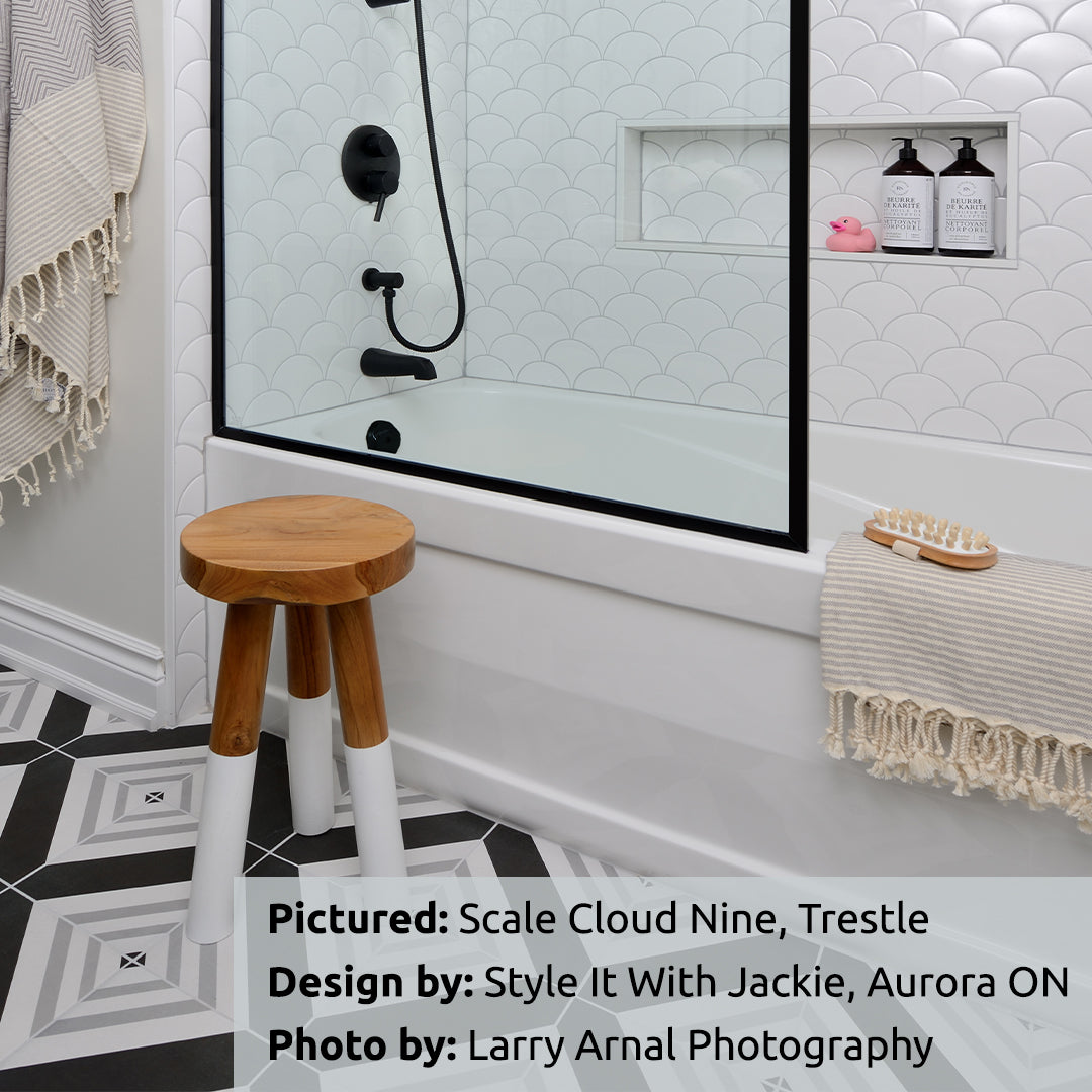 Scale Cloud Nine ceramic White scallop tile. Tile by Natucer and TilesInspired and available online across Canada. Trestle patterned black, grey and white porcelain tile. Tile by Elios and TilesInspired.
